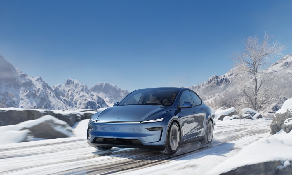 Blue Tesla Model Y Juniper in the snow