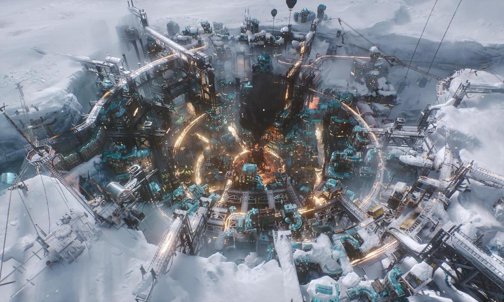 A city sits in a crater in Frostpunk 2.