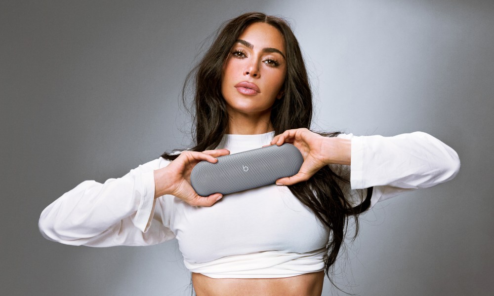 Kim Kardashian with the Kim x Beats collab for the Beats Pill speaker.