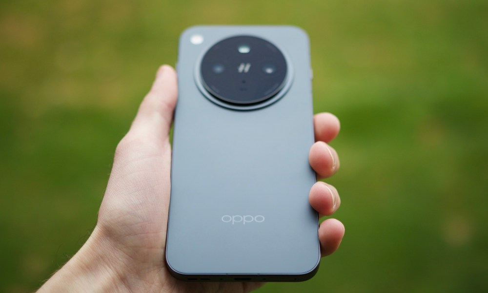 Someone holding the Oppo Find X8, showing the back of the phone.