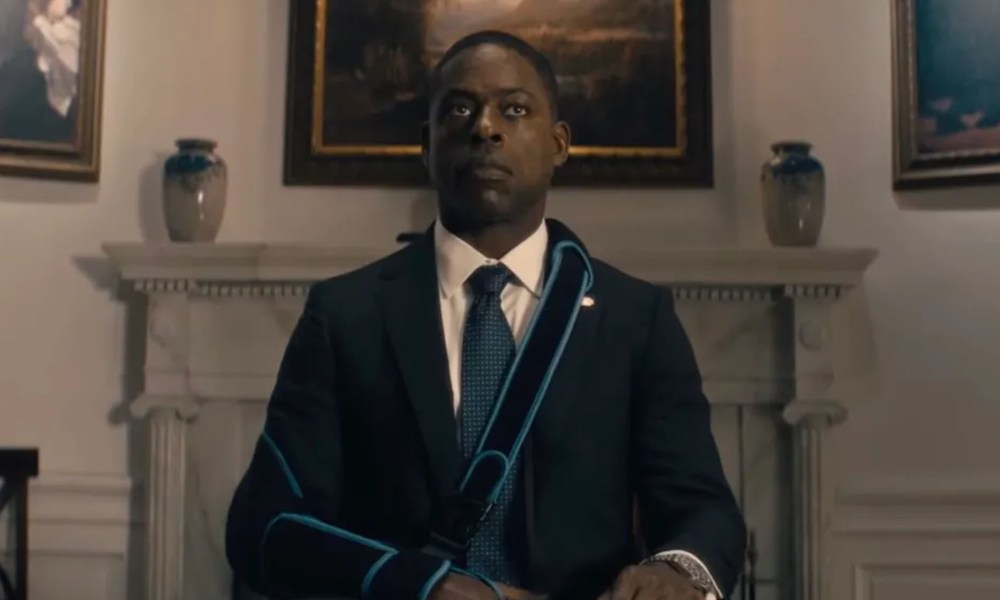 Sterling K. Brown in Paradise sitting in a chair