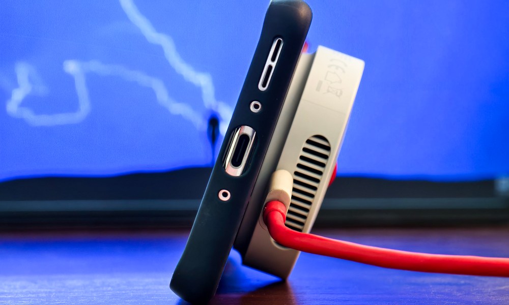 OnePlus AirVOOC 50W charger used as a stand.