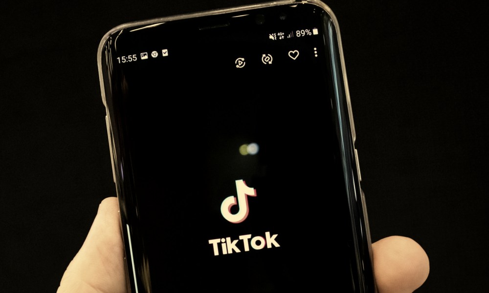 TikTok splash screen on an Android phone.