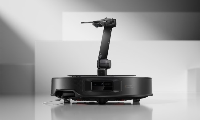 The Roborock Z70 with its arm extended.