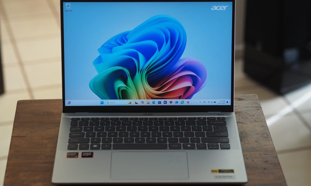 Acer Swift 14 AI AMD front view showing display and keyboard.