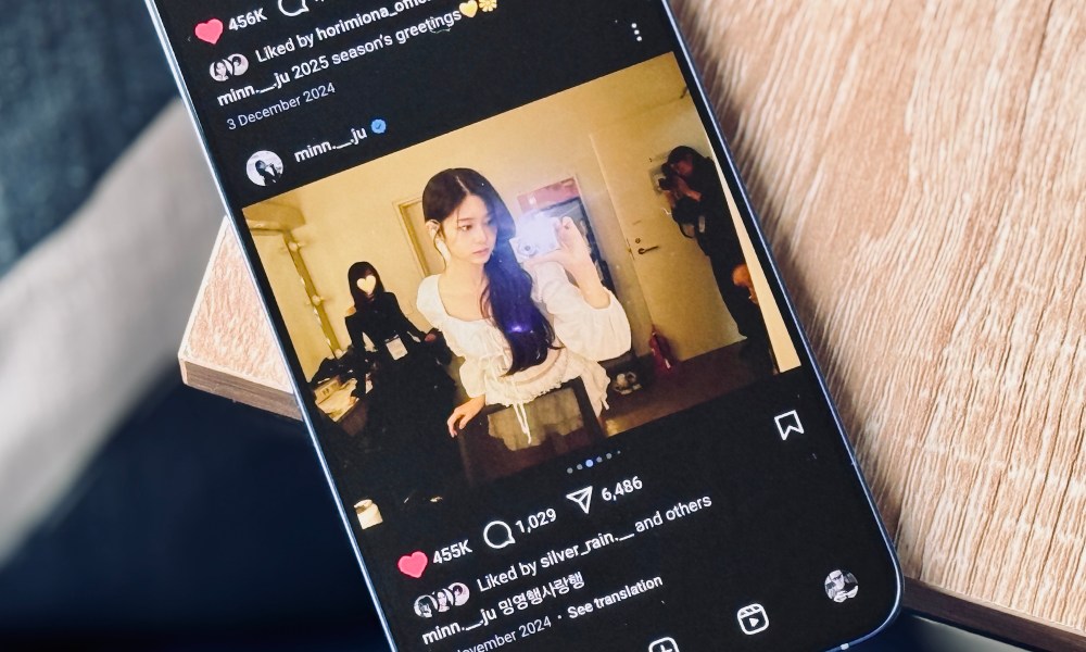 A photo of a Galaxy S25 Plus showing an Instagram page.